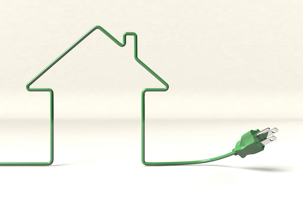 House outlined in a green electrical cord.