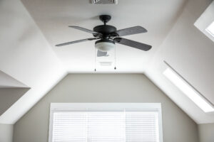 Ceiling fan in white room